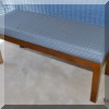 F39. Wooden bench with cushion. 17”h x 42”w x 16”w 